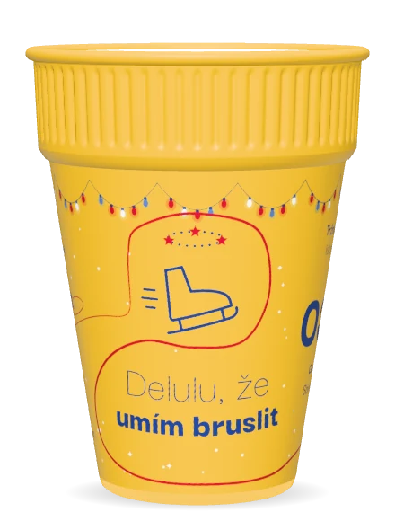 Žlutý kelímek s bruslí a hvězdičkami nad ní